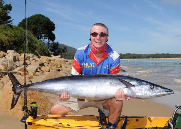 Chris Cleaver with his recently caught and released hybrid cod he likes to call a Murrout (cross between a Murray and trout cod).